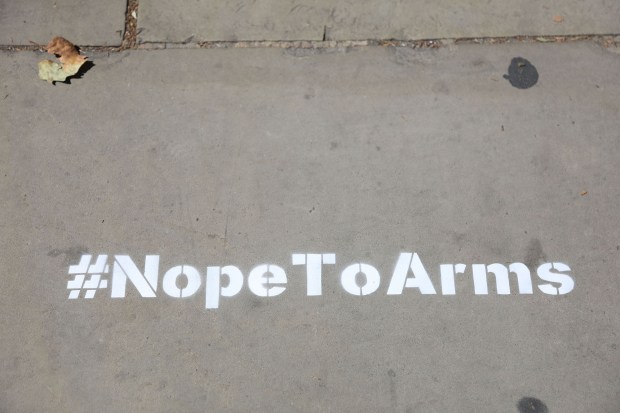 Members Of The Nope To Arms Collective Pull And Collect Their Art Work On Show At The Design Museum In Protest Against The Museum's Involvement With The Weapons Company Leonardo
